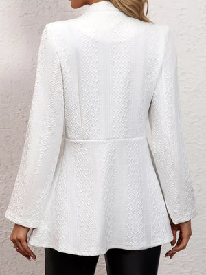 White textured slim fit open blazer with a geometric pattern and flared sleeves.