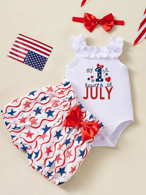 Patriotic baby outfit with ruffled white bodysuit and star-print bloomer shorts, red bows.
