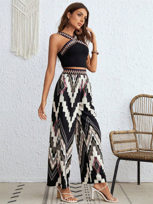 Black geometric print crossover crop top and wide leg pants set