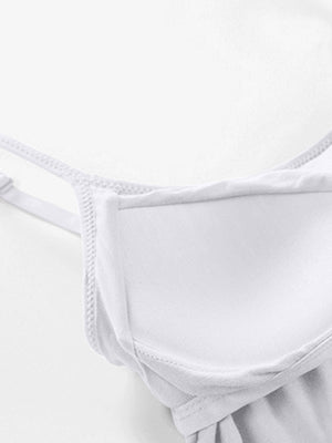 White soft-cup cami with adjustable straps and detailed stitching