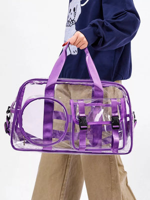 Chic clear PVC travel bag with purple accents and adjustable strap.
