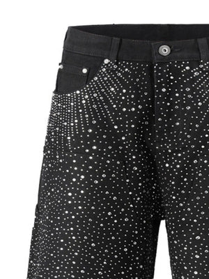 Black denim bermuda shorts with allover crystal burst embellishment.