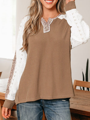 Waffle knit henley top in taupe with white lace sleeves and animal print trim.