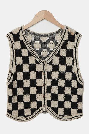 Checkerboard crochet vest in beige and black with button front and V-neck.