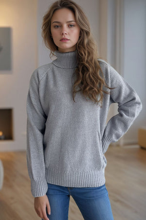 Gray speckled Donegal turtleneck pullover sweater with ribbed cuffs and hem