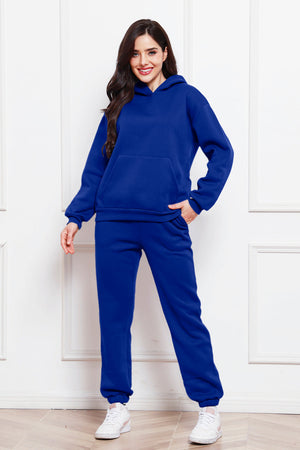 Royal blue relaxed hoodie and joggers set with a front pocket and cuffed ankles.