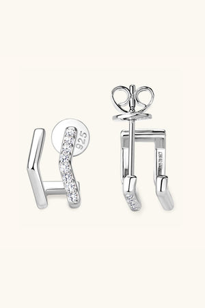 Geometric pavé silver ear jackets with 925 sterling silver and cubic zirconia accents.