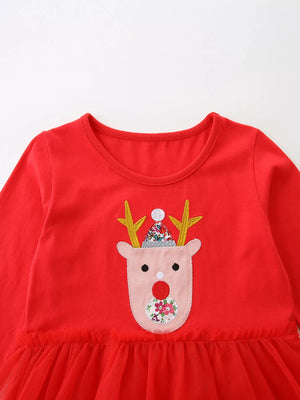Red cotton dress with reindeer applique and tulle skirt detail.
