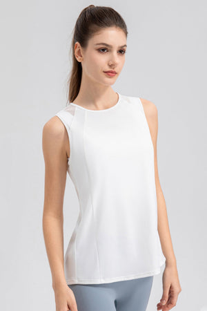 White mesh panel performance tank top with round neckline and sleeveless design.