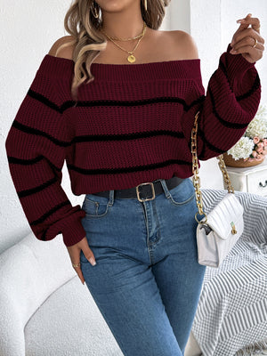 Burgundy off-the-shoulder striped knit pullover sweater with balloon sleeves.