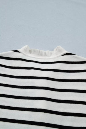Chic striped maternity cardigan with ruffle-trim neckline.