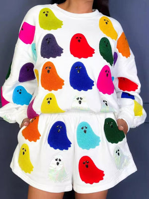 White loungewear set with colorful ghost appliqués and beaded eyes