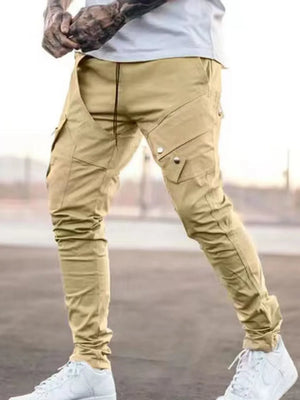 Tan zip pocket slim cargo trousers with multiple pockets and a drawstring waist.