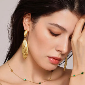 Textured gold leaf drop earrings with ribbed detail