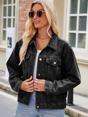 Faded black denim boxy fit jacket with button front and collar.