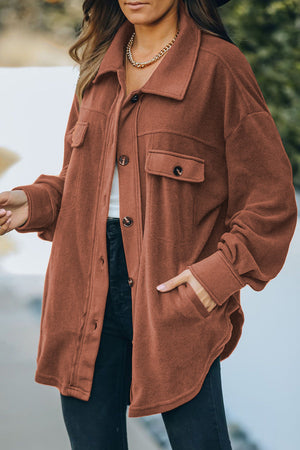 Fleece shirt jacket in Caramel with patch pockets and button front.