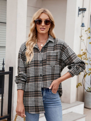 Oversized plaid shirt jacket in brown and black with a chest pocket and button front.