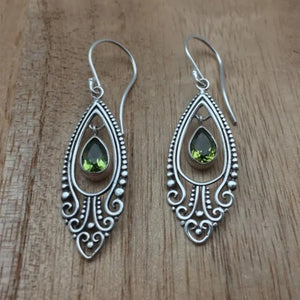 Silver filigree drop earrings with pear-shaped peridot stones