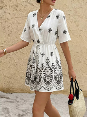Printed Surplice Half Sleeve Romper in White, side view