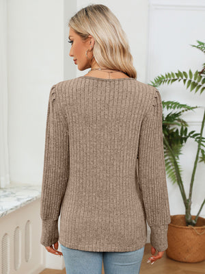 Khaki ribbed knit sweater with crochet trim detail and long sleeves.