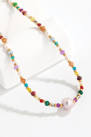 Multicolor beaded gemstone and pearl necklace with gold accents
