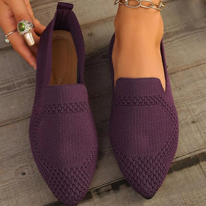 Plum purple knit pointed toe flats with textured detail.