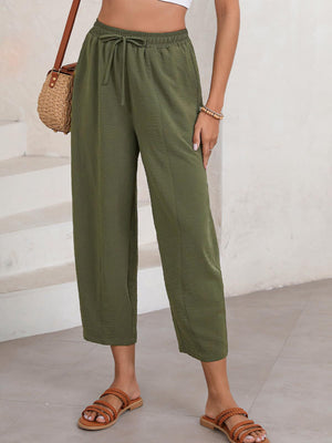 Textured seamed balloon crop trousers in Army Green with drawstring waist.