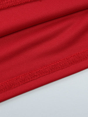 Red halter neck cami top with adjustable ties and deep v-neck detail.