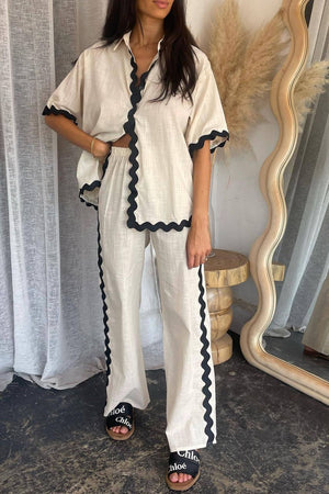 Beige linen shirt and pant set with black scalloped trim