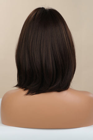 Black/Brown bob wig with wispy bangs, shown from the back.