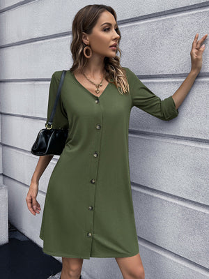 Olive green button-down mini dress with V-neck and 3/4 sleeves.