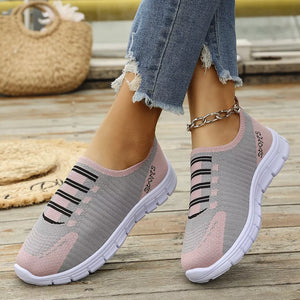 Round Toe Slip-ons in Black, back view