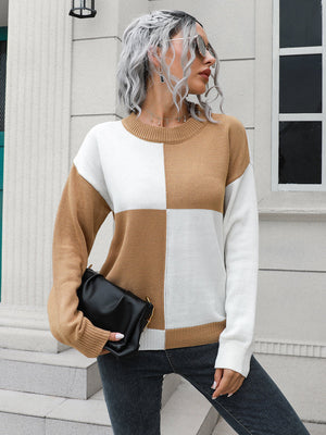 Colorblock knit sweater with crew neck and long sleeves in camel and white acrylic.