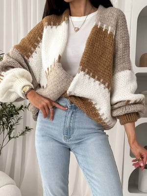 Brown, white, and beige striped open front cardigan with balloon sleeves.
