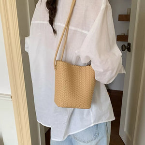 Woven Straw Crossbody Bag in Yellow, model styling view