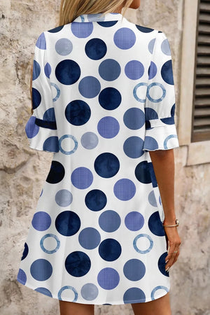 Chic blue polka dot mini dress with flounce sleeves and a-line cut.