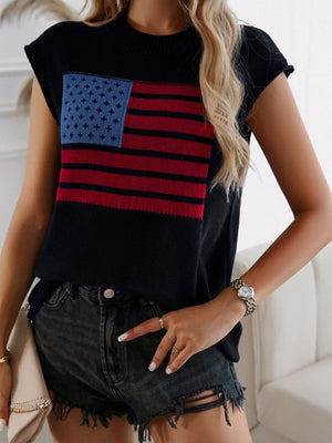 Black knit vest with American flag graphic, mock neck, and cap sleeves.