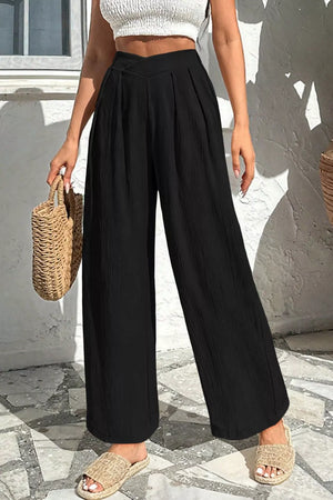 Black textured maternity wide-leg pants with crossed waist detail
