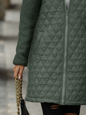 Army green teddy and quilted hybrid coat with diamond quilting and fuzzy sleeves.