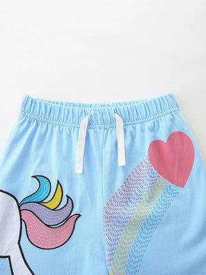 Light blue cotton shorts with unicorn and rainbow heart print, elastic waistband with drawstring.