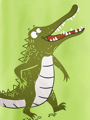 Toddler t-shirt with a green crocodile graphic on a lime green background.