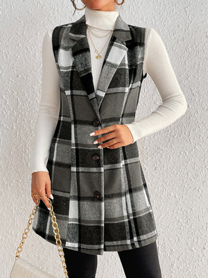 Black plaid sleeveless blazer dress with button front and notched lapels.