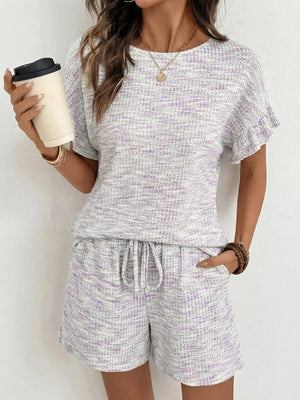 Ruffled sleeve top and drawstring shorts set in a marled white and purple textured knit.