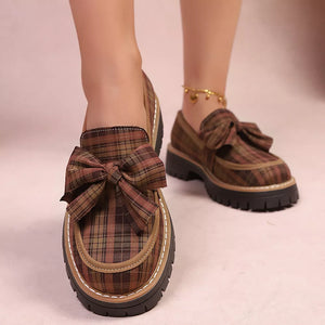 Plaid chunky loafers with bow accent in tan, featuring a lug sole.