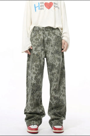 Camouflage wide-leg denim trousers in Sage, featuring a relaxed fit and casual style.