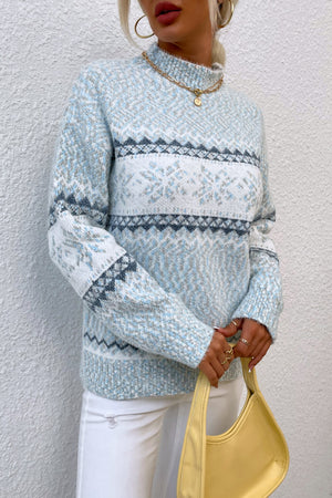 Nordic Fair Isle mock neck knit sweater in Pastel Blue with snowflake pattern.