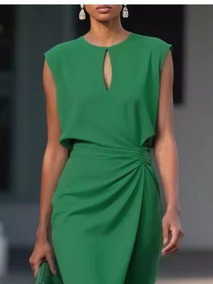Dark green ruched dress with keyhole neckline and cap sleeves