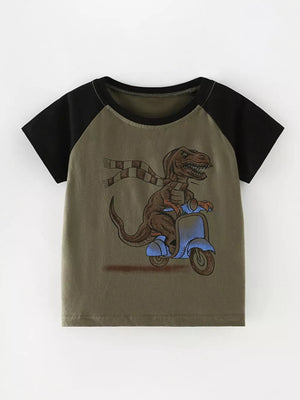 Toddler t-shirt with dinosaur graphic on scooter, crew neck, cotton, raglan sleeves.