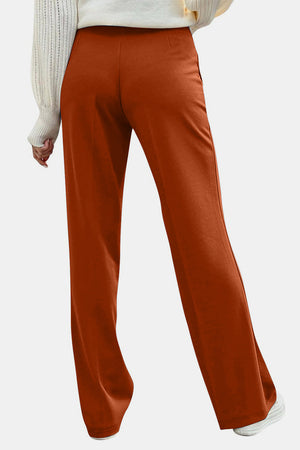 Button detail wide leg trousers in caramel, shown from the back.