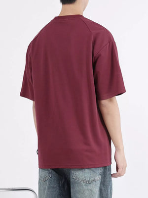 Men's dark purple cotton round neck t-shirt with short sleeves.